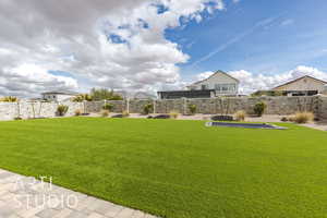 View of yard with a fenced backyard