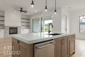 Kitchen featuring dishwasher, open shelves, a wealth of natural light, and a sink