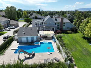 View of swimming pool featuring a patio area, a fenced in pool, an in ground hot tub, and fence private yard