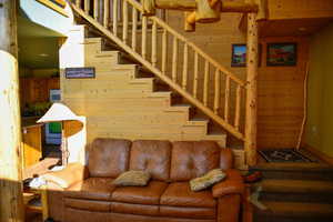 Staircase with wood walls