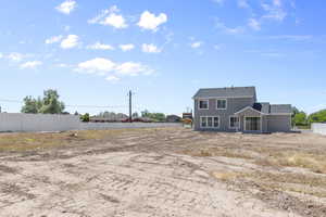 View of yard featuring fence