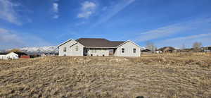 Exterior space featuring a mountain view
