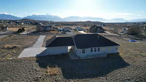 Drone / aerial view featuring a mountain view and a residential view