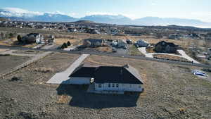 Birds eye view of property with a mountain view