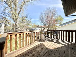 Wooden deck featuring a residential view