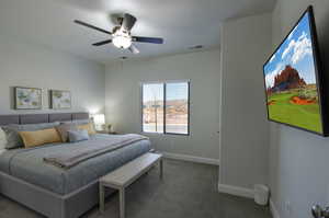 Carpeted bedroom featuring baseboards, visible vents, and ceiling fan