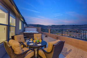 View of patio / terrace featuring a fenced backyard and a hot tub