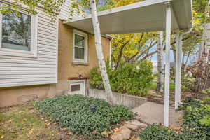 Entrance to property featuring brick siding