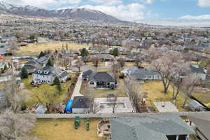 Drone / aerial view featuring a residential view and a mountain view