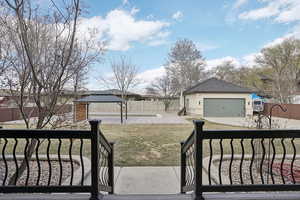 View of yard with a gazebo, a garage, and a fenced backyard