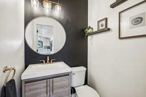 Bathroom featuring toilet and vanity