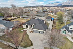 Aerial view featuring a mountain view and a residential view