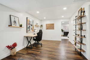 Office area with recessed lighting, visible vents, baseboards, and hardwood / wood-style flooring