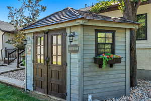 View of outdoor structure with an outbuilding