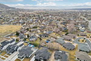 Drone / aerial view featuring a mountain view and a residential view