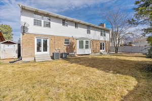 Large, fully fenced back yard with mountain views.