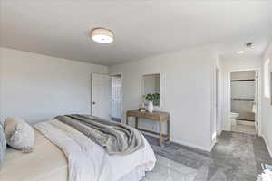 Master bedroom with access to on-suite bath and walk in closet.