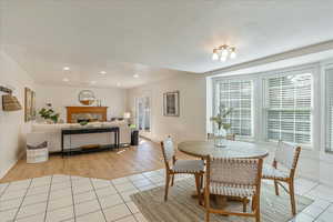 Dining area separates kitchen from family room.