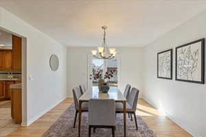 Spacious dining room connects to kitchen and living room.