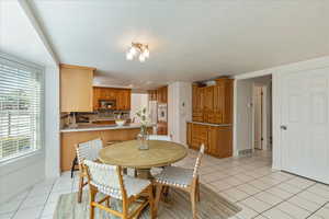 Kitchen/dining area connects to main hallway.