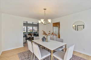 Dining room connects to kitchen and living room.