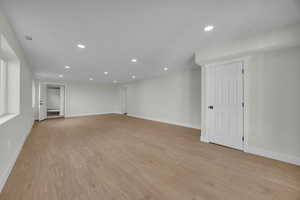 Spare room with visible vents, recessed lighting, light wood-type flooring, and baseboards