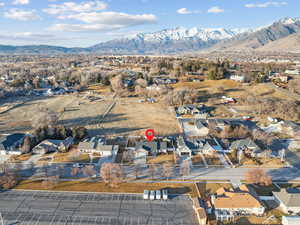 Aerial view featuring a mountain view and a residential view