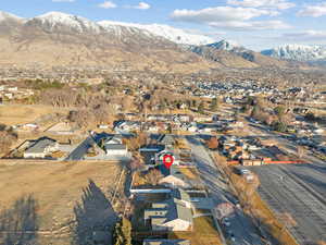 Drone / aerial view featuring a mountain view and a residential view