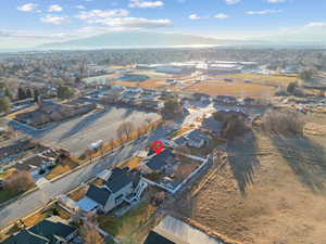 Drone / aerial view featuring a mountain view and a residential view