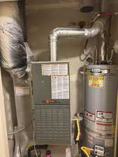 Utility room with water heater