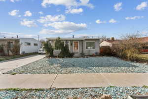 View of front facade with concrete driveway