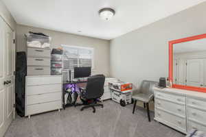 Carpeted bedroom/ home office with visible vents