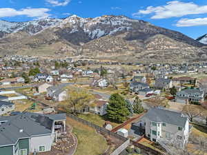 Drone / aerial view with a mountain view and a residential view