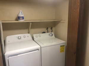 Clothes washing area with washing machine and clothes dryer and laundry area
