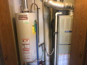 Utilities featuring gas water heater and heating unit