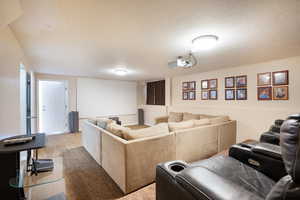 Carpeted theatre style room with theatre style seating arrangements