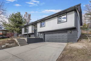 Front of the house. Garage and driveway