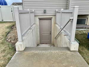 Doorway to property with fence