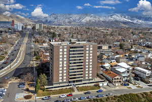 Birds eye view of property with city and mountain views