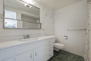 Full bathroom with shower and tub