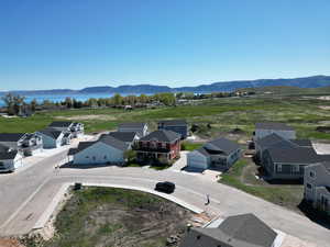 Looking west; Future pool location in the foreground, existing homes in the subdivision, and Bear Lake