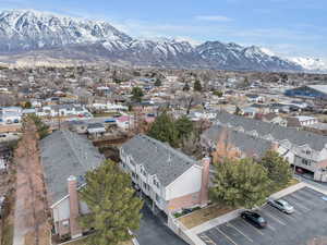 Drone / aerial view featuring a residential view and a mountain view