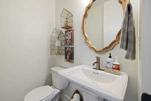 Bathroom with a sink and toilet