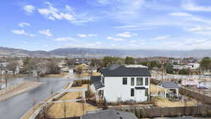 Drone / aerial view with a mountain view and a residential view