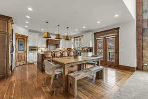 Dining space featuring recessed lighting, baseboards, and hardwood / wood-style flooring