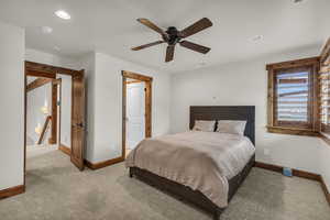 Carpeted bedroom featuring visible vents, recessed lighting, a ceiling fan, and baseboards