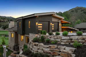 Modern home with a mountain view and a chimney