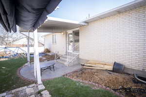 Exterior space featuring fence and entry steps