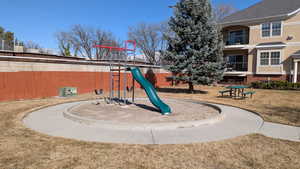 Communal playground featuring a yard