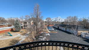 Balcony with a mountain view and a residential view